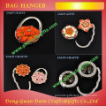 die-casting flower pattern bag hanger for retail and wholesale
